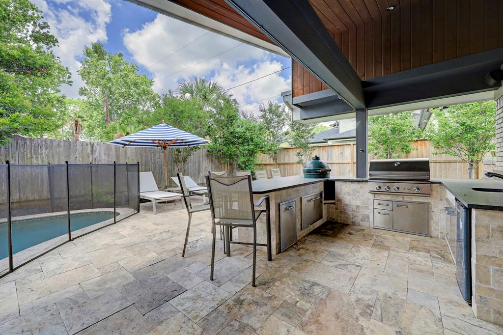 Pool and outdoor kitchen at 1509 Longacre Drive